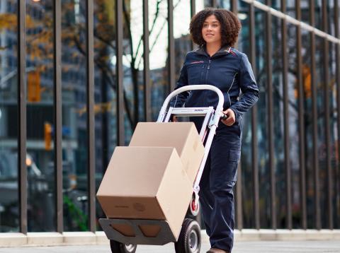 Employee delivering packages